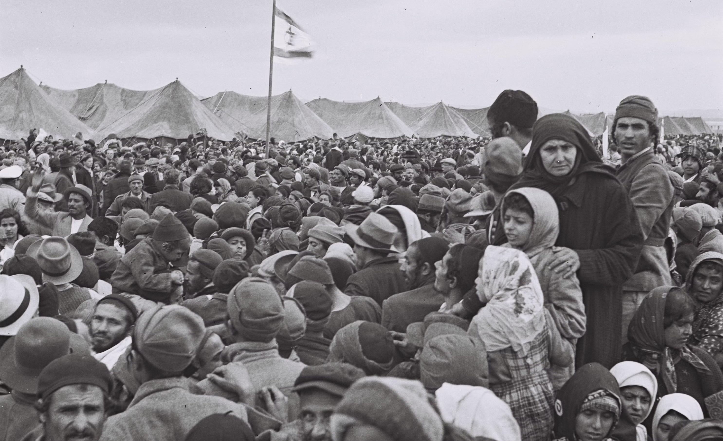 Immigrants from Yemen celebrating their first Tu Bishvat in Israel, at the Rosh Ha'Ayin immigrants camp, 1950